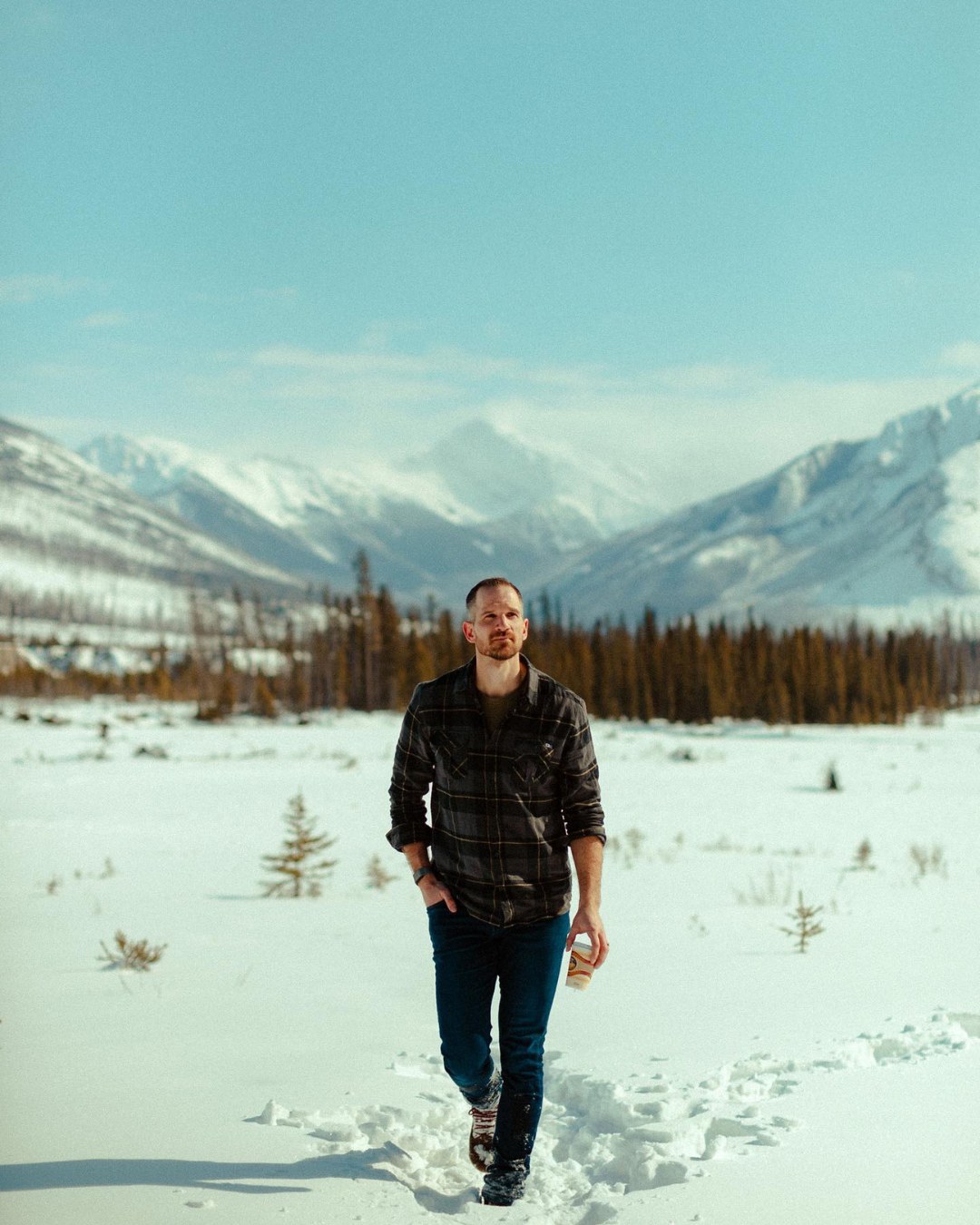 Matt Chenard walking in the mountains